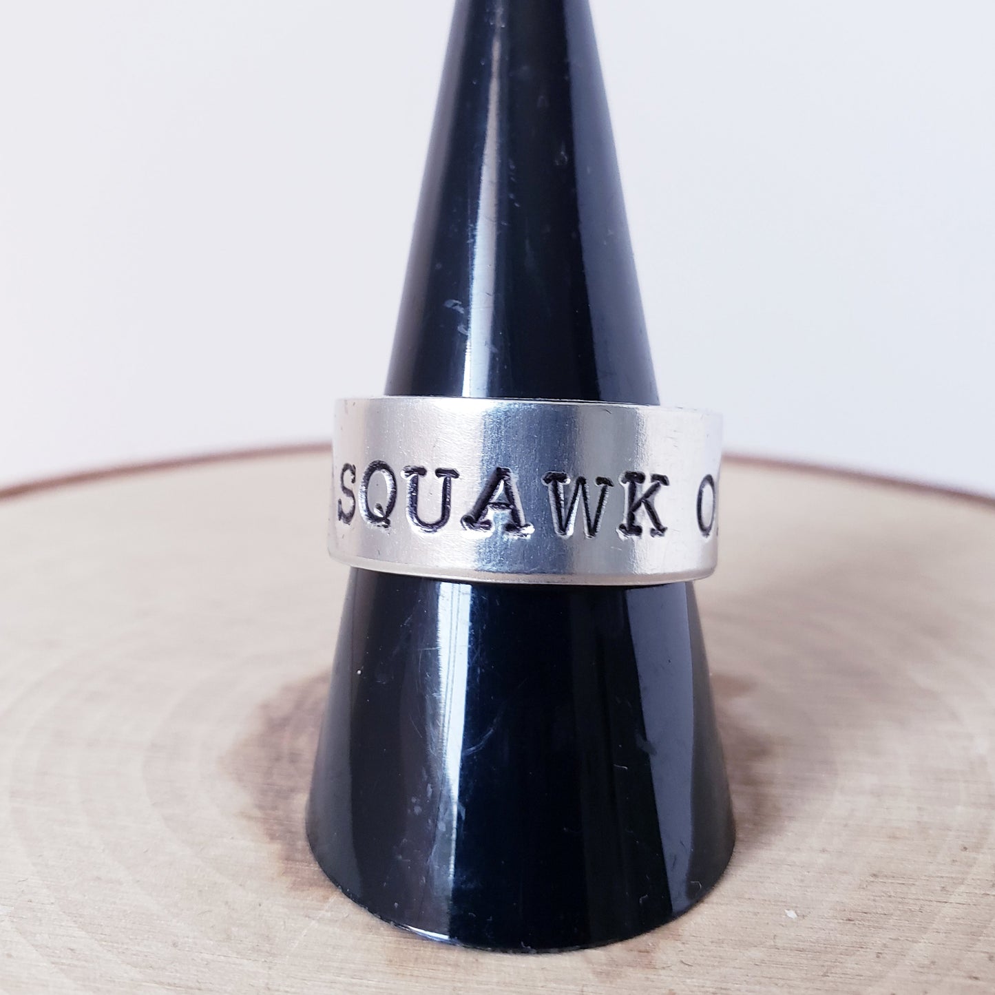 SQUAWK OFF Ring