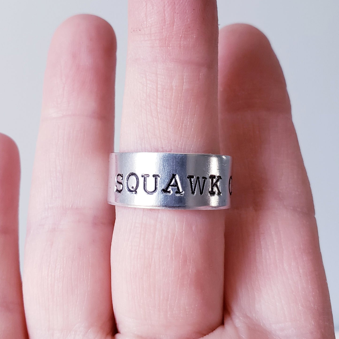 SQUAWK OFF Ring