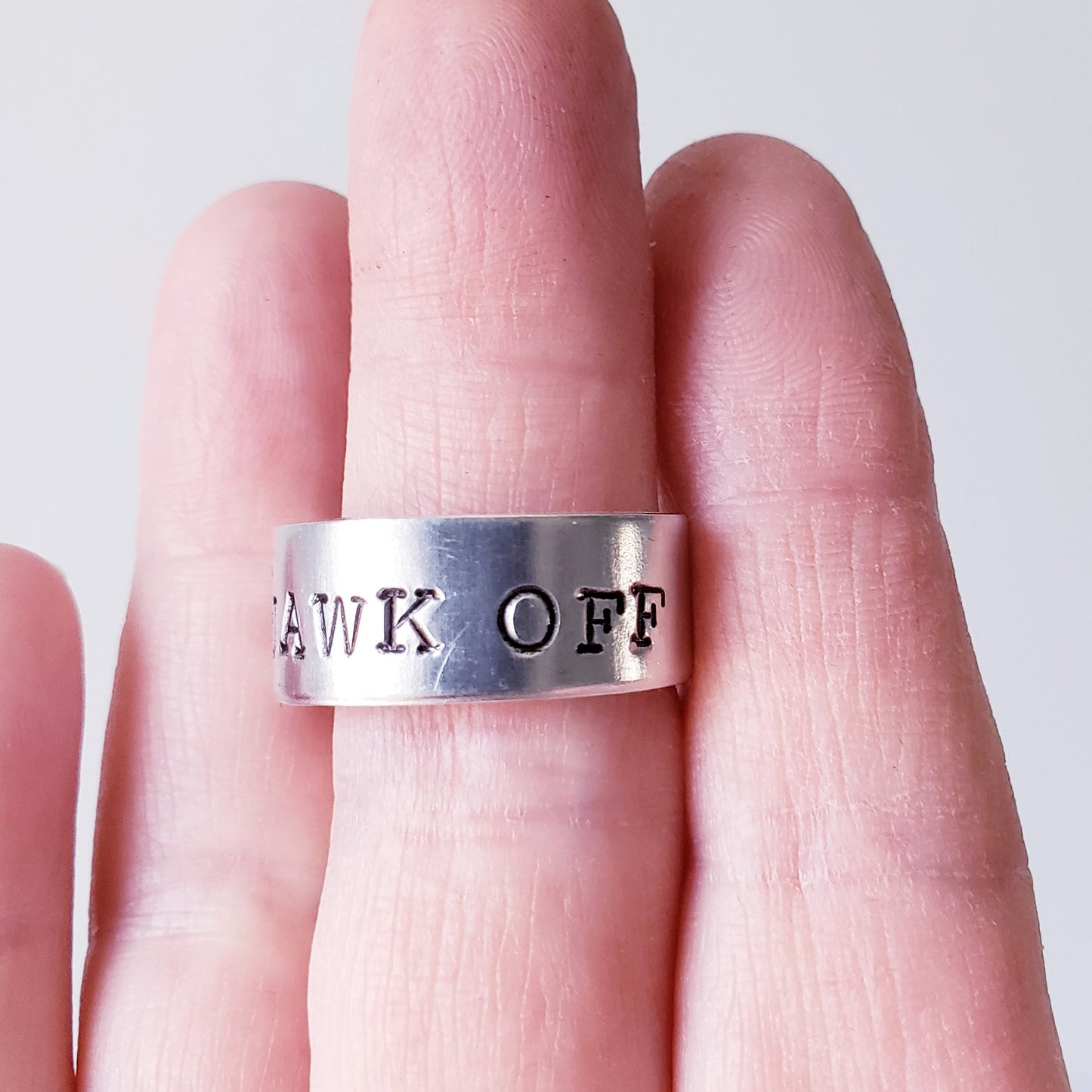 SQUAWK OFF Ring